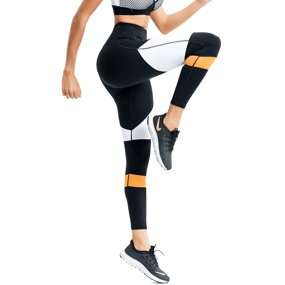 Woman wearing stylish leggings with vibrant accents, perfect for workouts, featuring high-waisted fit and moisture-wicking fabric.